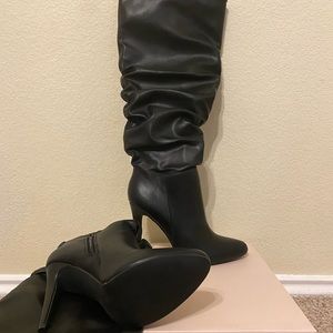 Black knee length boots